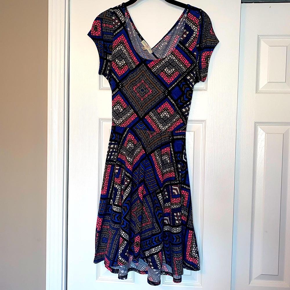 Fit and flare peek-a-boo back dress